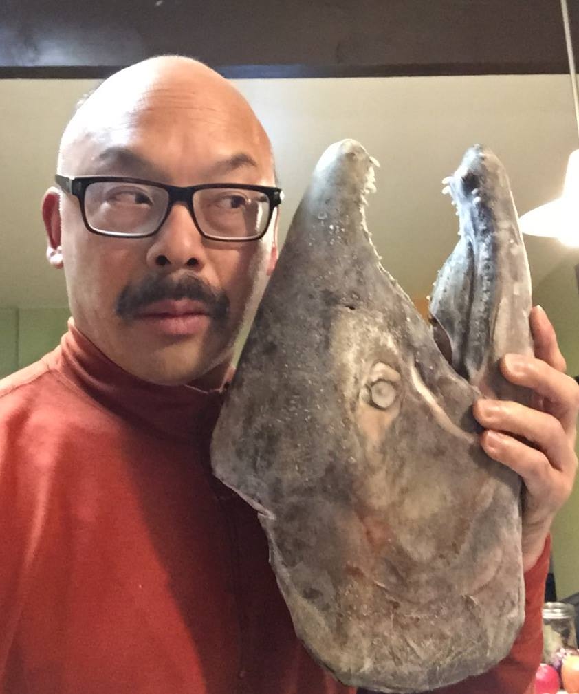 Warner Lew, Herring Evangelist pictured with giant King Salmon head. 