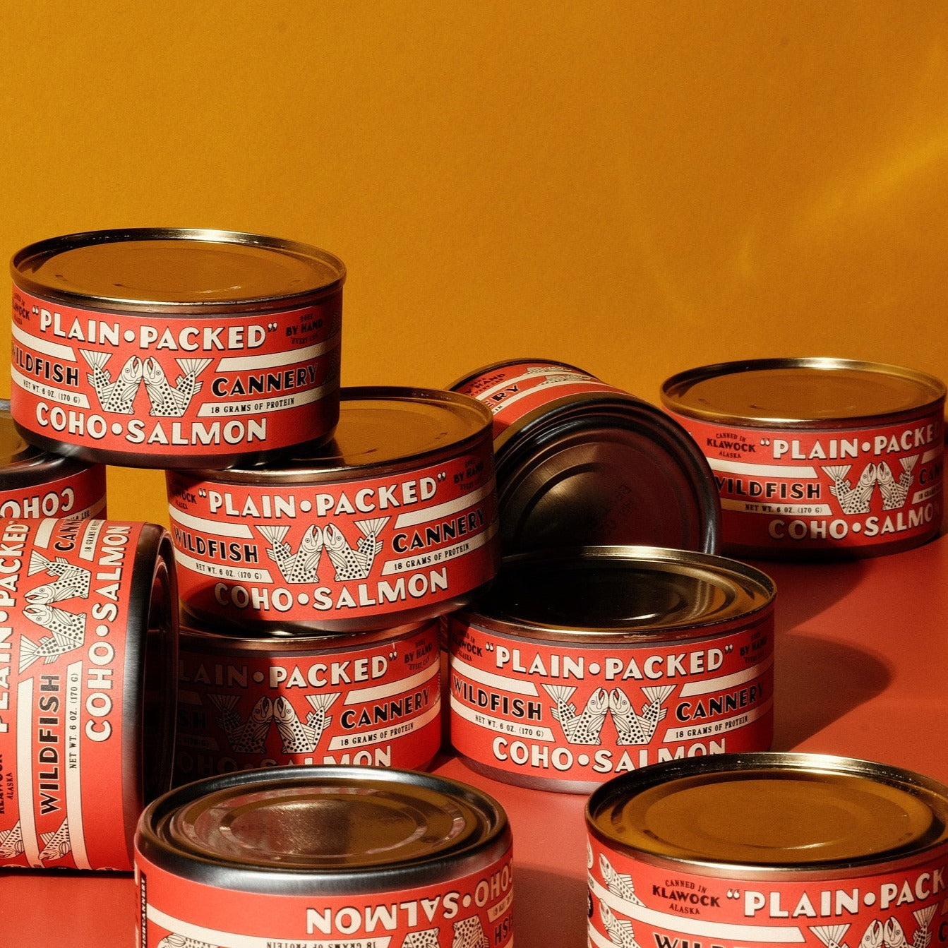 Pile of Plain Packed Coho cans