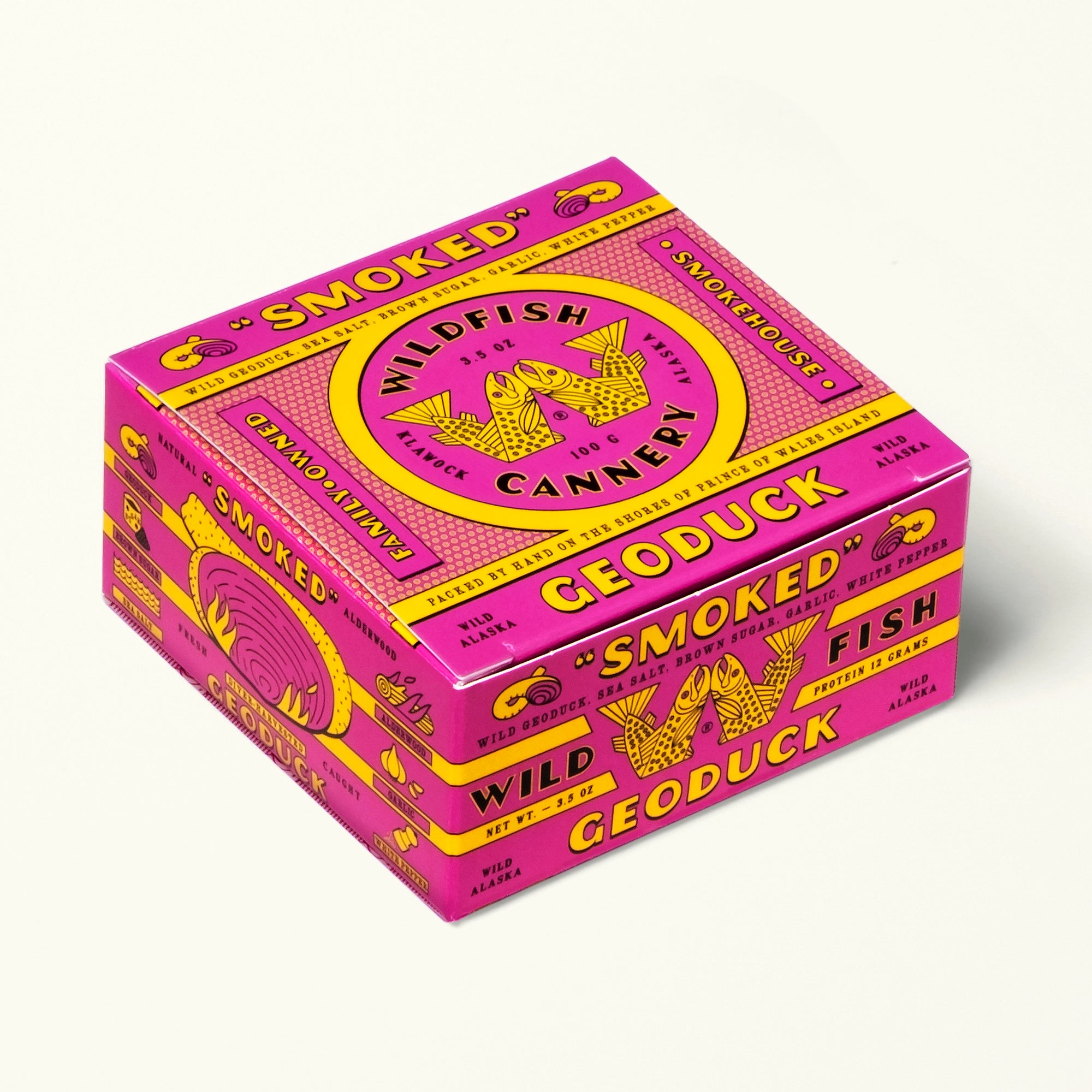 Pink and yellow box of smoked fish from Wildfish Cannery on a white background