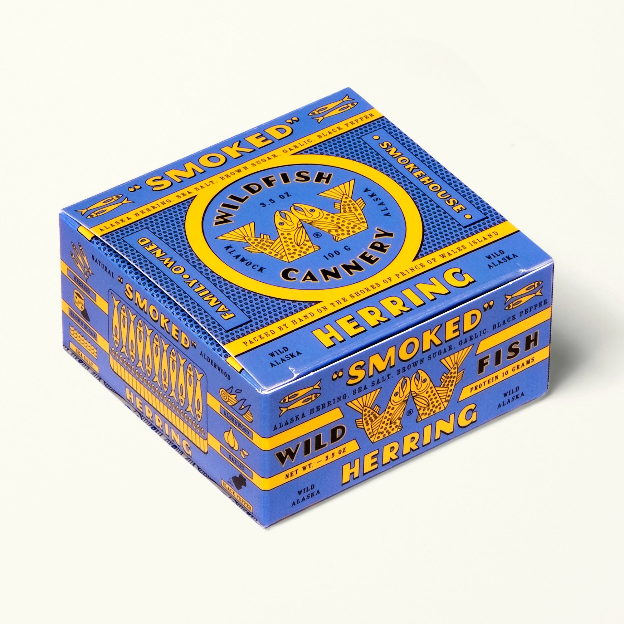 Blue and yellow box of smoked herring from Wildfish Cannery on a white background